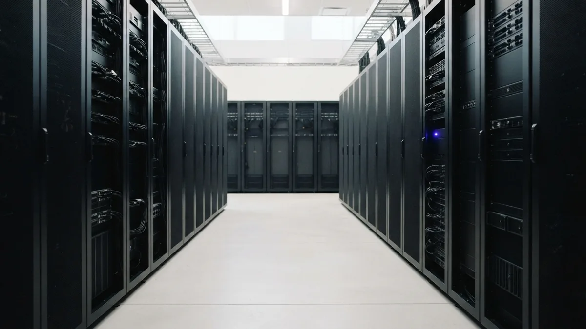 Server space for a growing online store Clean server aisle representing different ecommerce website size and cost levels