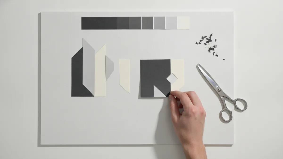 Build your mood board from references to a clear story Designer arranging references and color swatches while building a mood board.